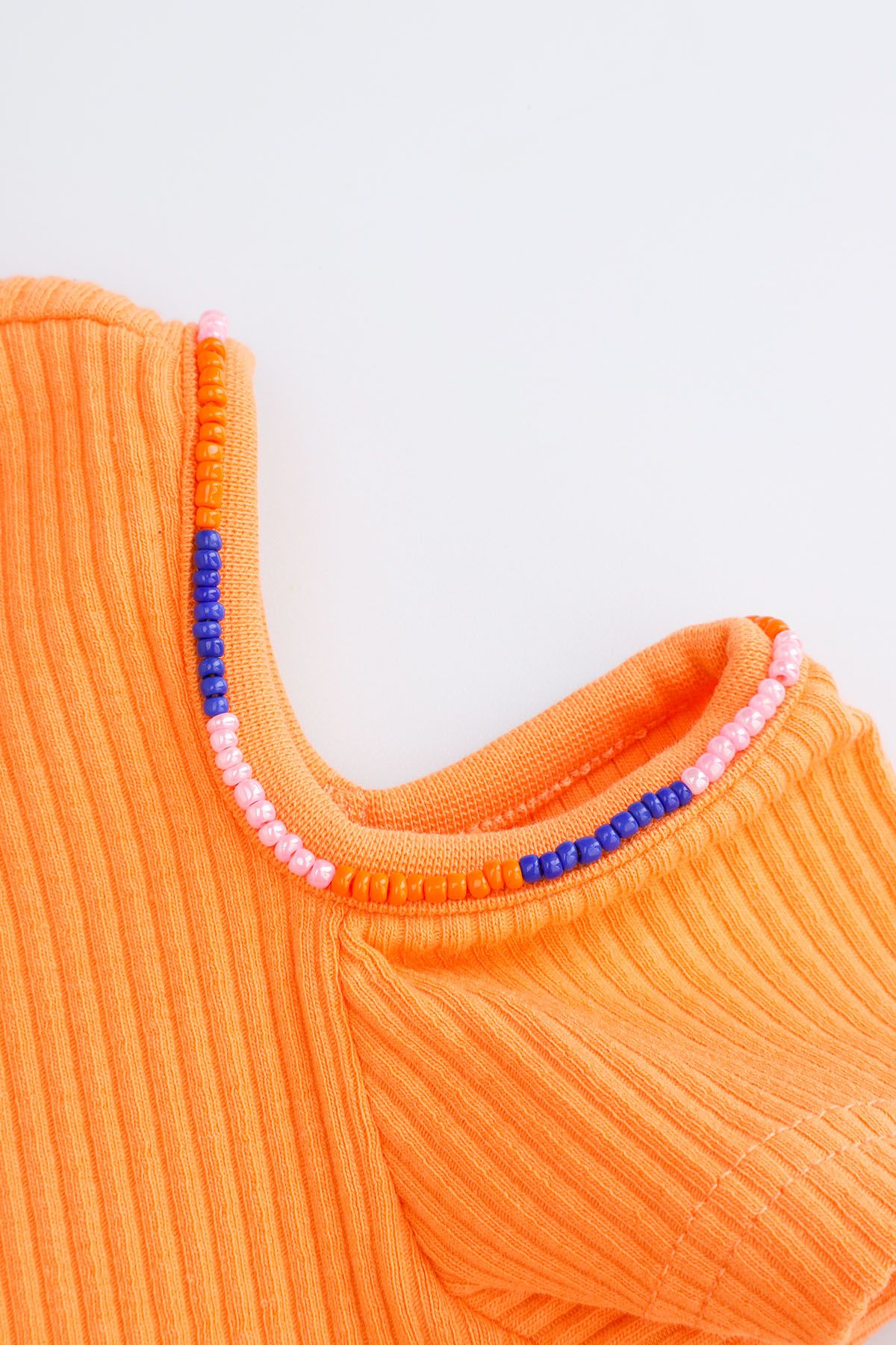 Ribbed short sleeve t-shirt orange with decorative cutouts