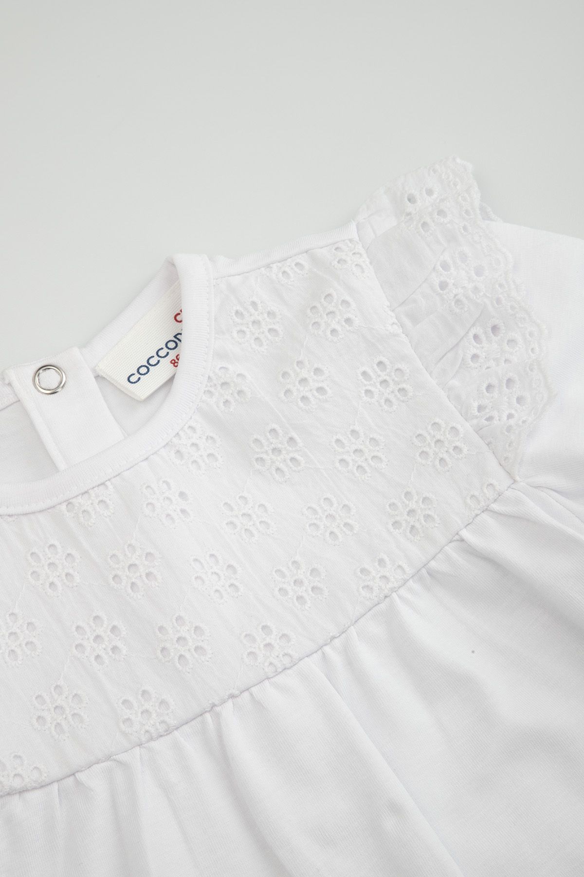 Body z długim rękawem białe z falbankami na ramionach