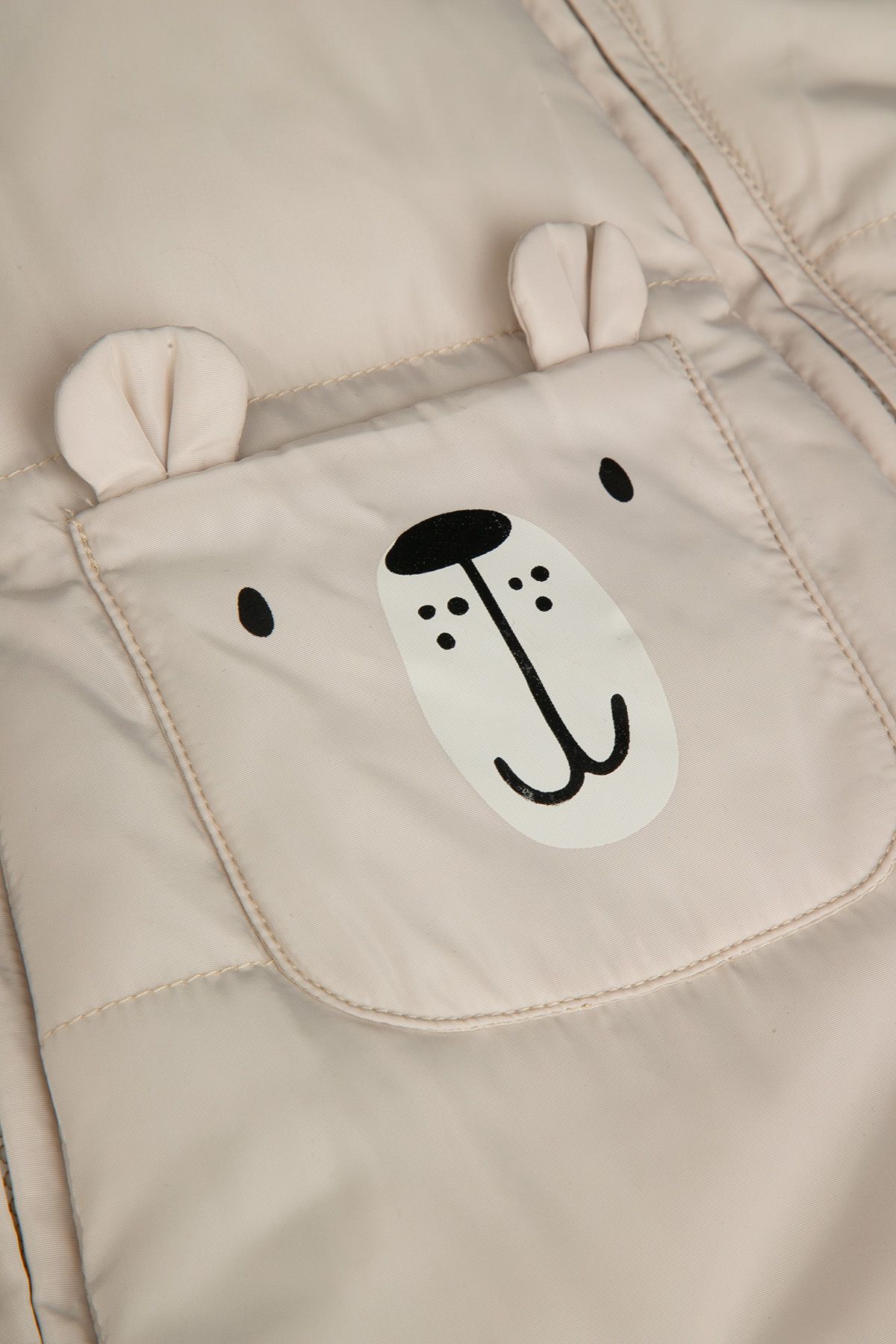 Kombinezon zimowy beżowy ze stopami, kapturem i bawełnianą