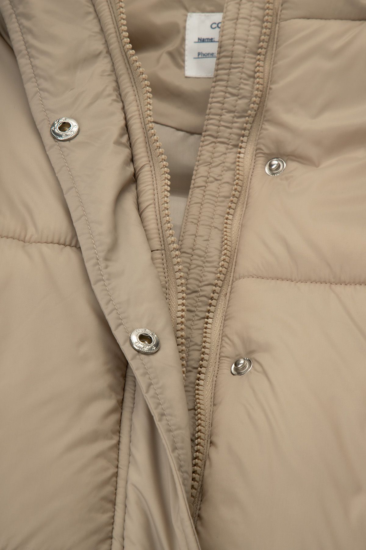 Bezrękawnik pikowany beżowy z kapturem i kieszeniami - Coccodrillo