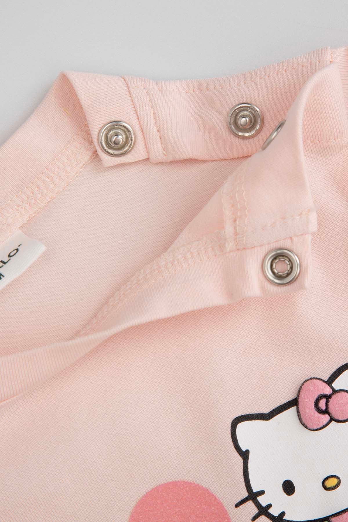 T-shirt z długim rękawem różowy z nadrukiem i falbaną